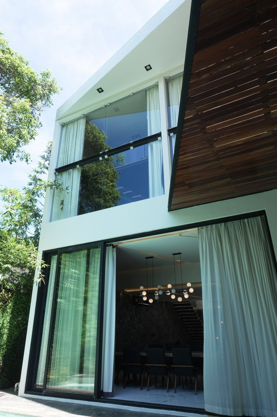 Casa 223 · Club Real, Playacar — fachada entre la selva